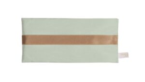 Jade silk eye pillow with honey-coloured band on a white background