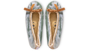 Jade silk velvet massaging slippers with honey trim and removable insoles on a white background