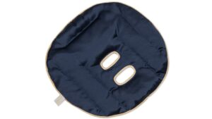 Navy blue silk face pillow with oval breathing holes and honey-coloured trim