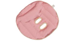Rose pink silk face pillow with oval cut-outs and honey-coloured edging