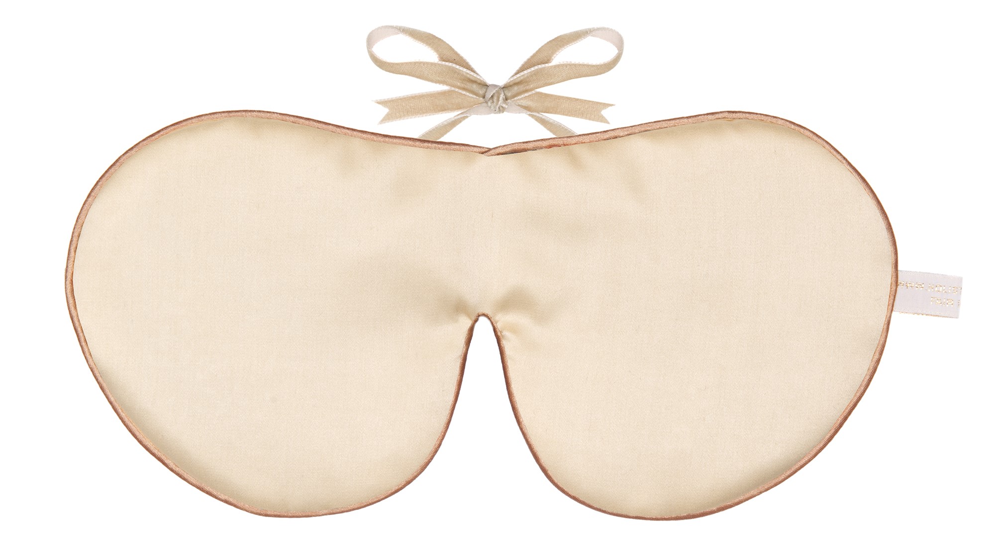Cream silk sleep mask with a soft bow tie fastening.