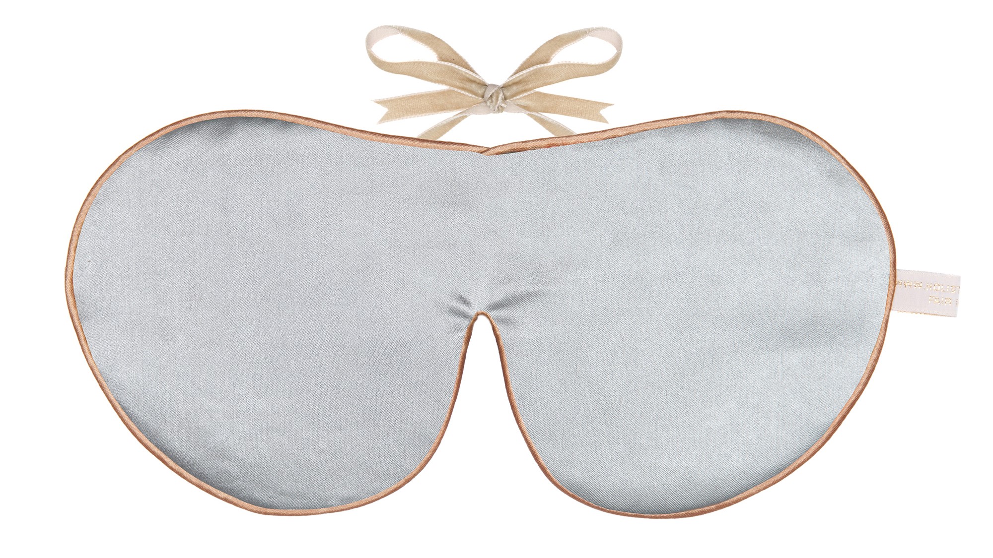 Silver silk sleep mask with honey colour piping and a ribbon tie